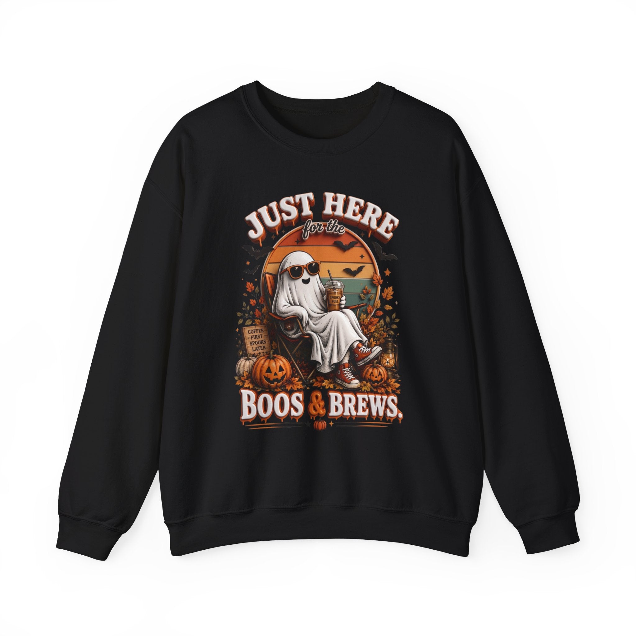 Black crewneck sweatshirt laid flat, printed with a ghost in sunglasses kicks back with an iced coffee
