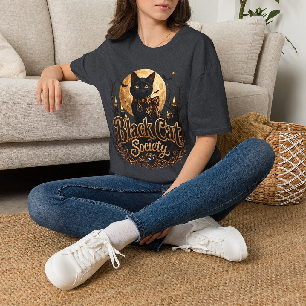 Dark Heather Grey t-shirt laid flat, printed with a black cat before a glowing full moon