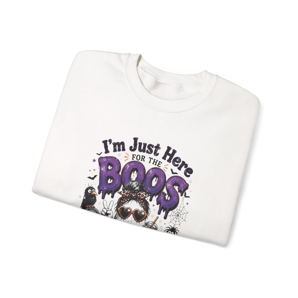 White crewneck sweatshirt folded to show the three cartoon ghosts in sunglasses print