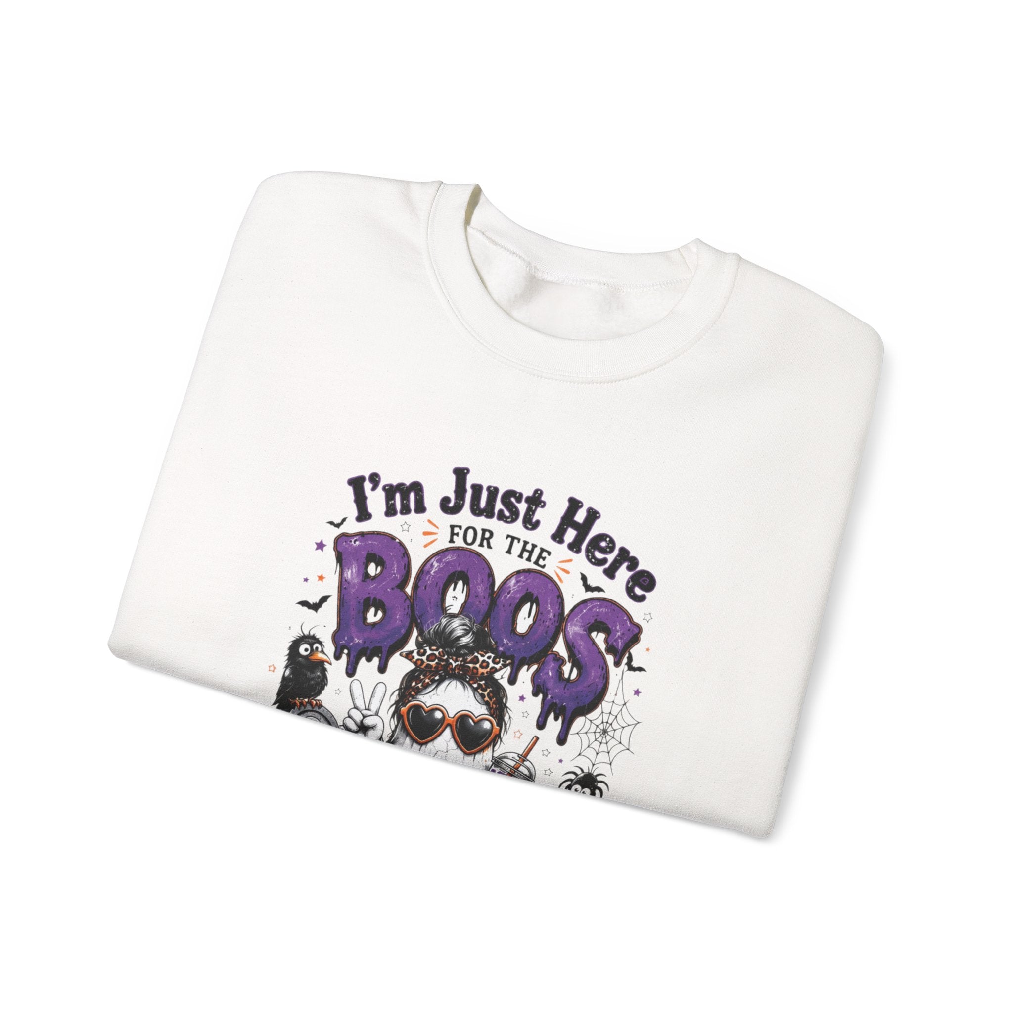 White crewneck sweatshirt folded to show the three cartoon ghosts in sunglasses print