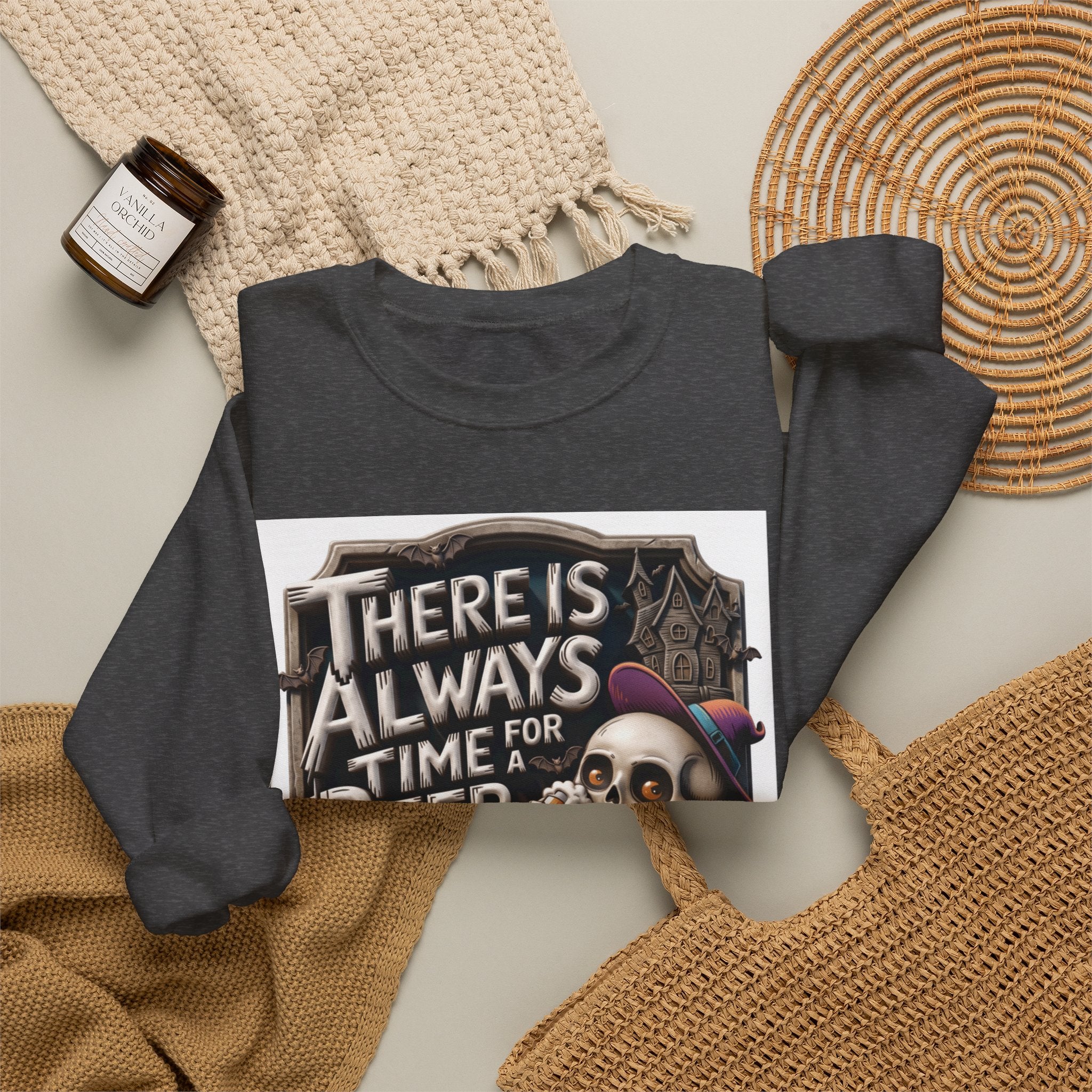 Dark Heather crewneck sweatshirt styled flat with a candle — skeleton in a floppy purple hat