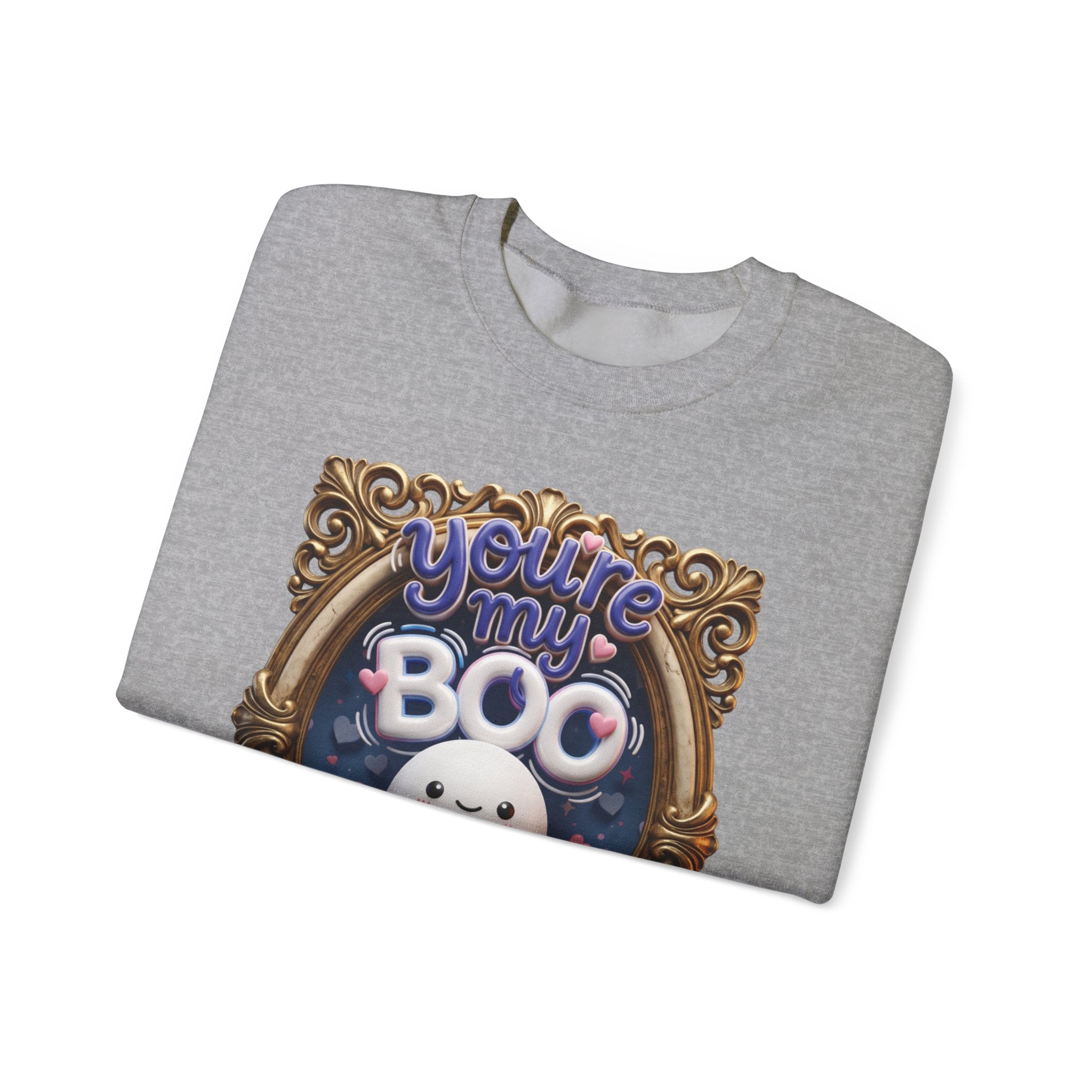 Sport Grey crewneck sweatshirt folded to show the round smiling ghost floats inside a gilded vintage frame print