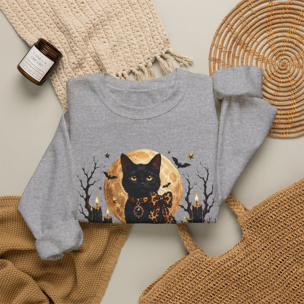 Sport Grey crewneck sweatshirt styled flat with a candle — black cat before a full moon