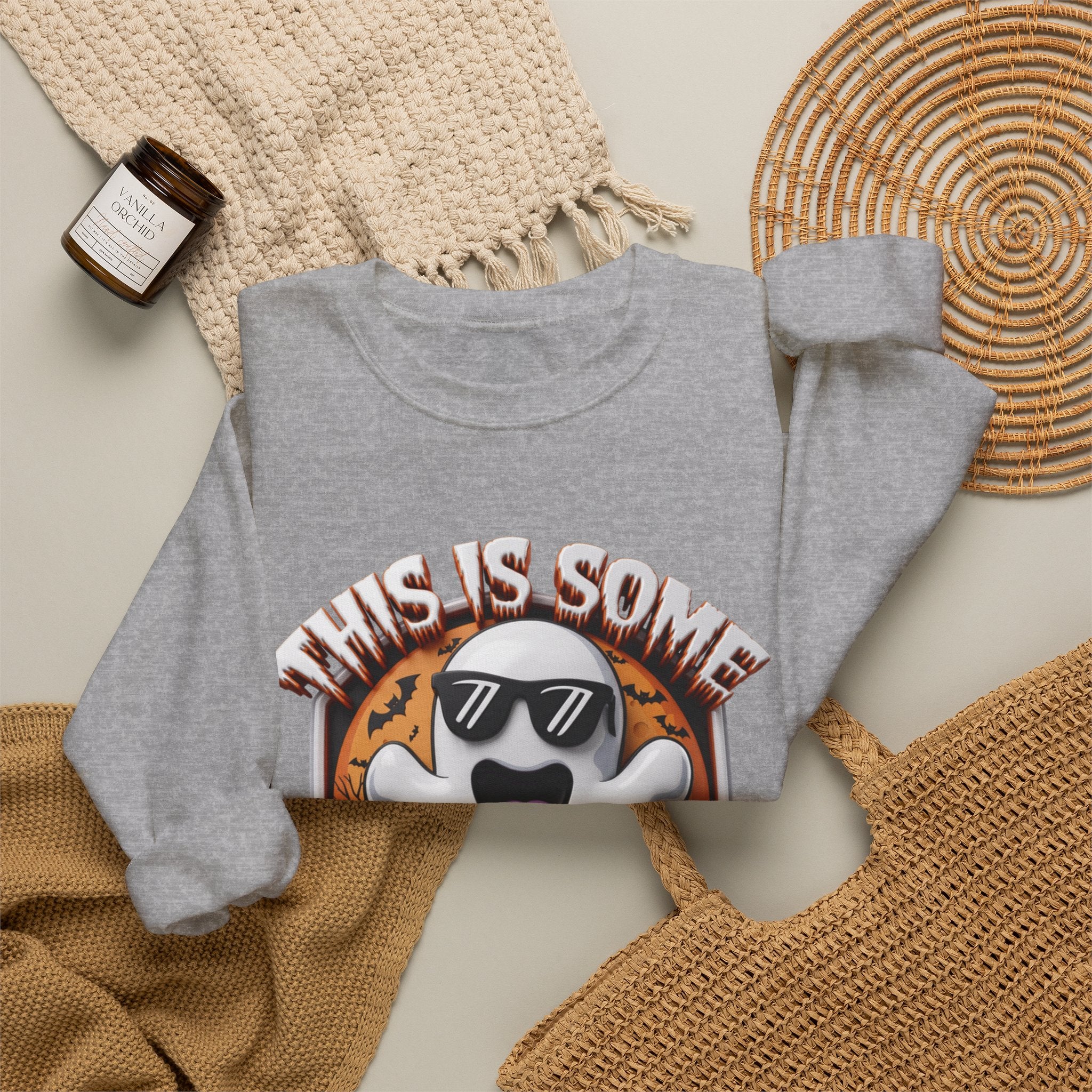 Sport Grey crewneck sweatshirt styled flat with a candle — cartoon ghost in dark sunglasses