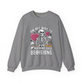 Graphite Heather crewneck sweatshirt laid flat, printed with a two line drawn skeletons under pink hearts