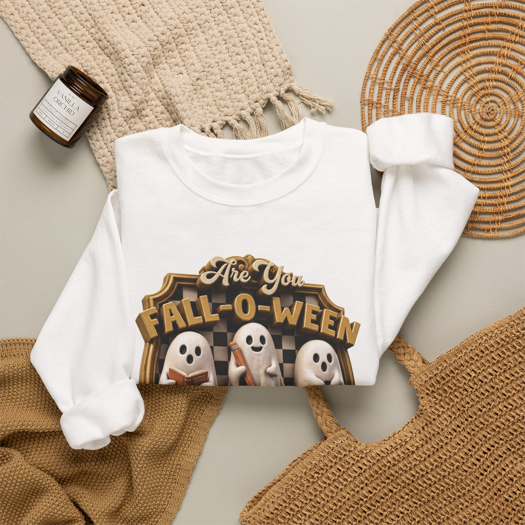 White crewneck sweatshirt styled flat with a candle — three sheet ghosts reading a book