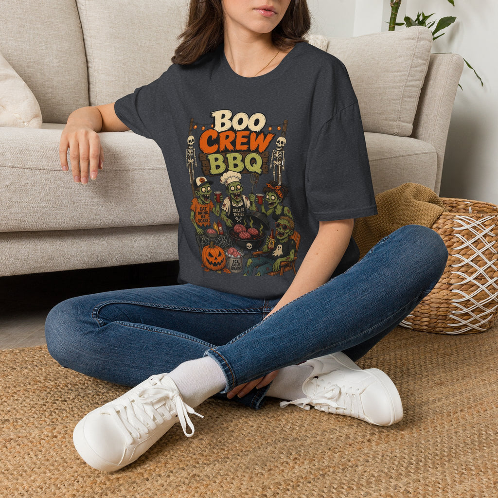 Dark Heather Grey t-shirt laid flat, printed with a skeletons and zombies crowded around a smoking grill