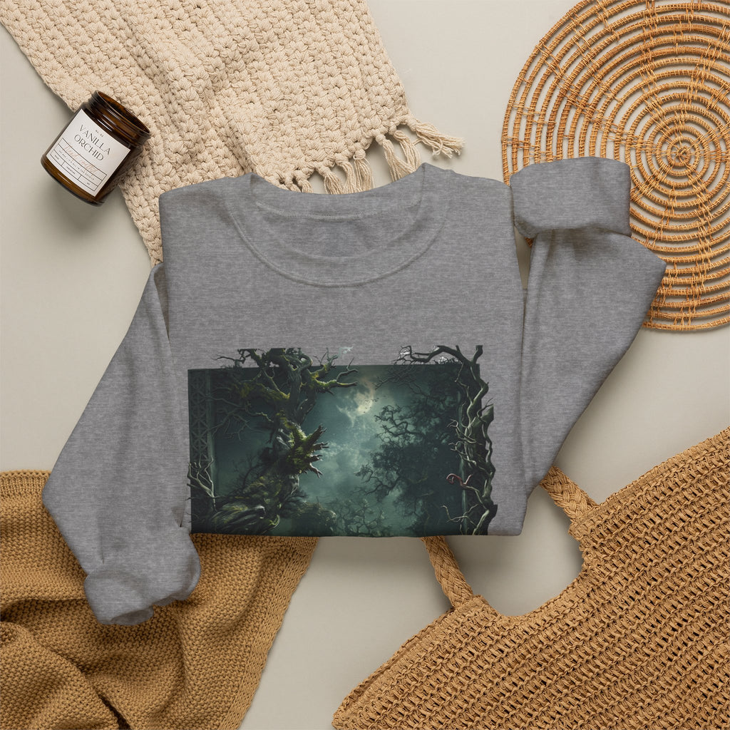Graphite Heather crewneck sweatshirt styled flat with a candle — moonlit forest of gnarled mossy trees