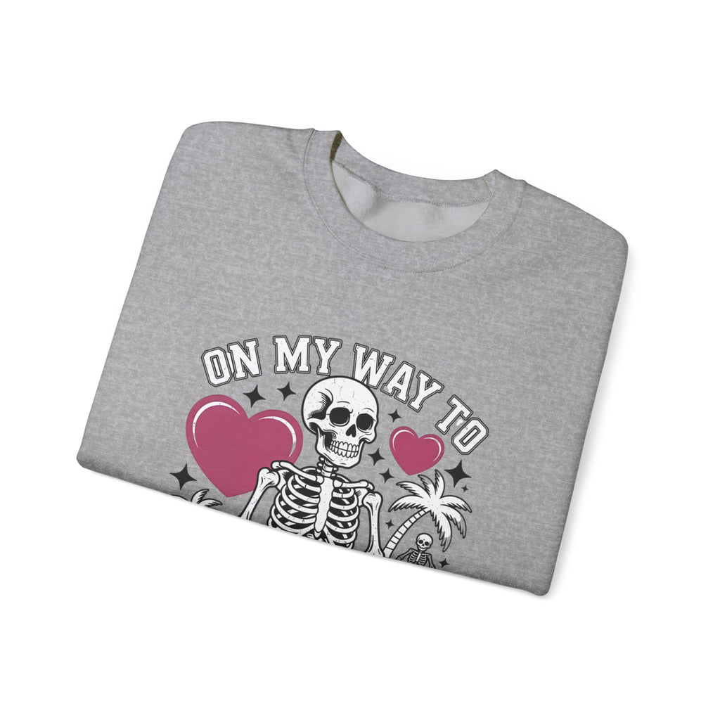 Sport Grey crewneck sweatshirt folded to show the two line drawn skeletons under pink hearts print