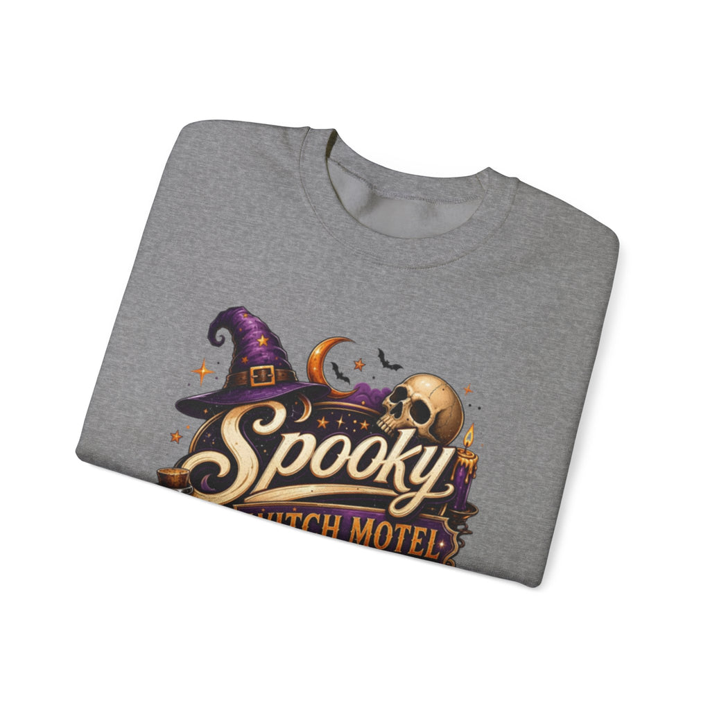 Graphite Heather crewneck sweatshirt folded to show the neon vintage motel sign reading spooky witch motel print