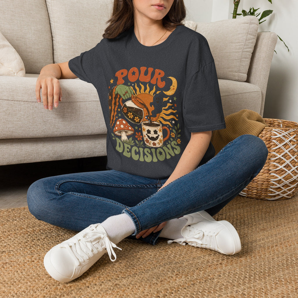 Dark Heather Grey t-shirt laid flat, printed with a green witch hand tipping a flower-patterned coffee pot into