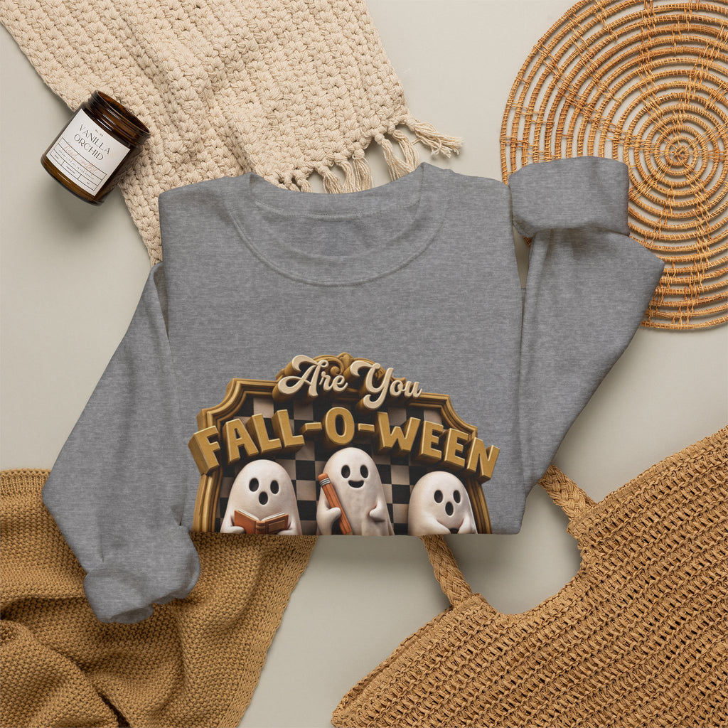 Graphite Heather crewneck sweatshirt styled flat with a candle — three sheet ghosts reading a book