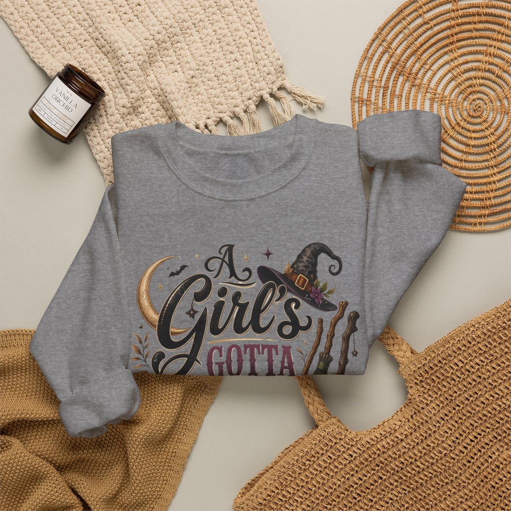 Graphite Heather crewneck sweatshirt styled flat with a candle — hand-lettered A Girl's Gotta Have Options