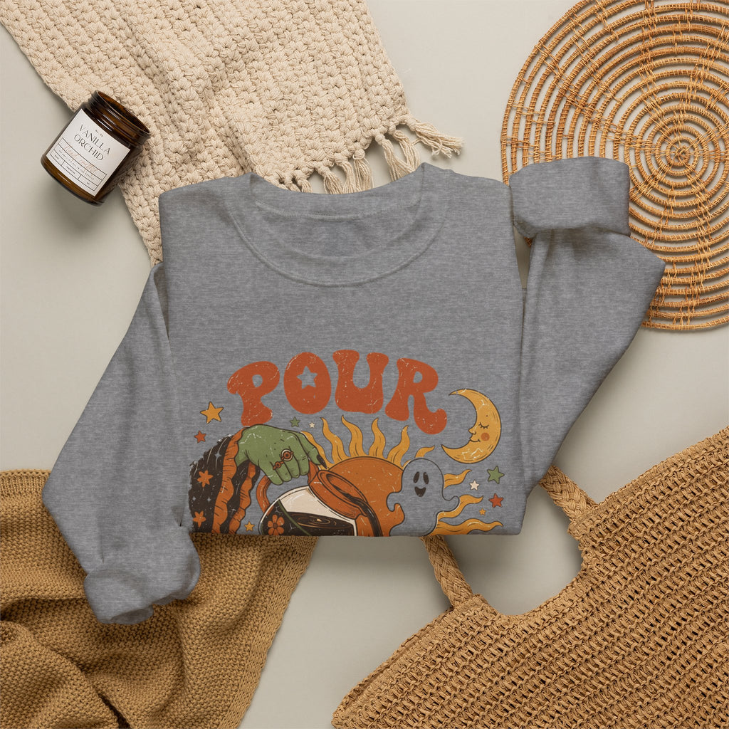 Graphite Heather crewneck sweatshirt styled flat with a candle — green witch hand pouring coffee