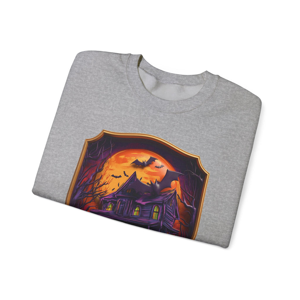 Sport Grey crewneck sweatshirt folded to show the purple haunted mansion sits under a blazing orange moon print