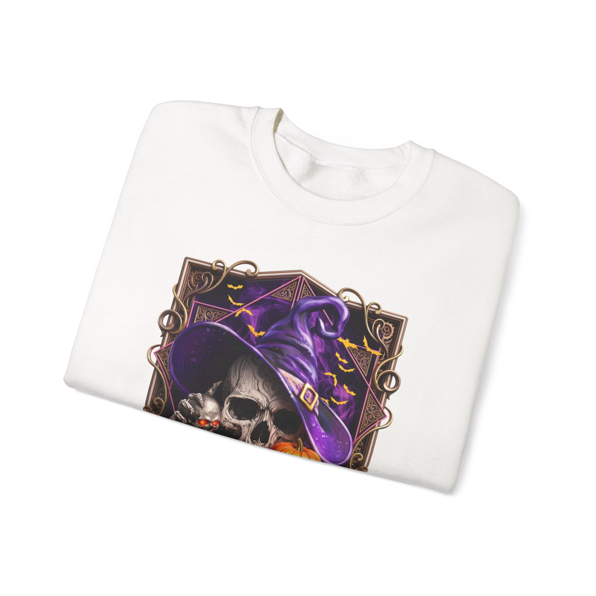 White crewneck sweatshirt folded to show the skull in a slouchy purple witch hat peers out print