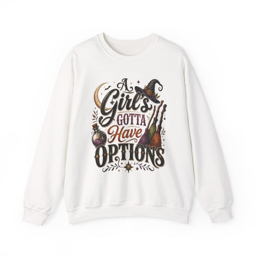 White crewneck sweatshirt laid flat, printed with a hand-lettered script reading a girl's gotta have options