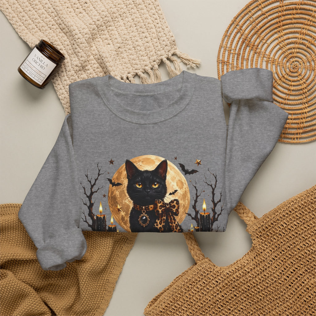 Graphite Heather crewneck sweatshirt styled flat with a candle — black cat before a full moon